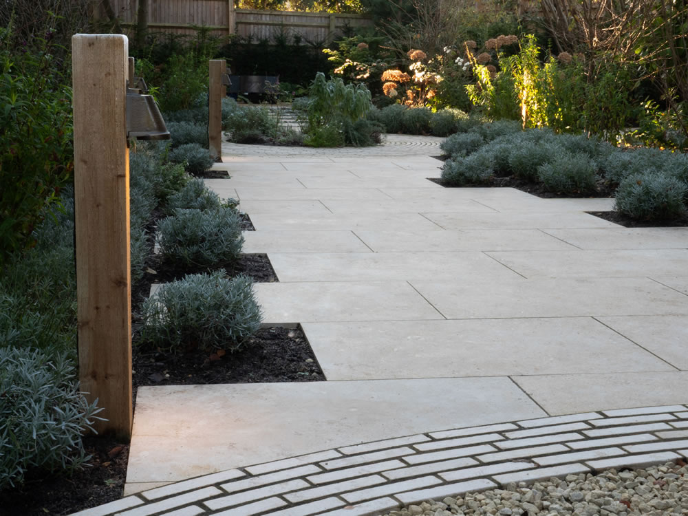 Heritage-sensitive garden lighting design featuring architectural downlighting and KNX smart home automation in a luxury Oxford garden project