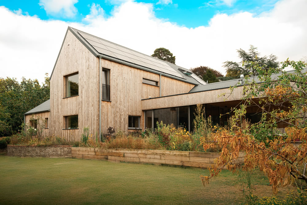 Sustainable timber framed Passivhaus home delivered in line with EnerPHit retrofit standards featuring AVINU KNX smart home automation