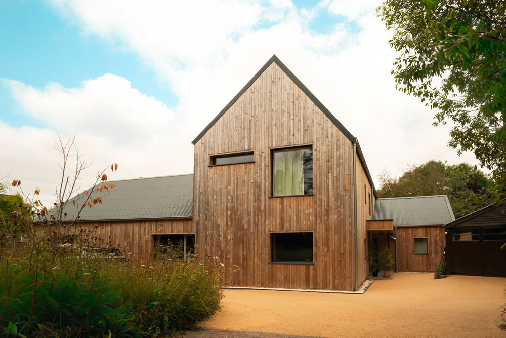 Sustainable timber framed Passivhaus home delivered in line with EnerPHit retrofit standards featuring AVINU KNX smart home automation
